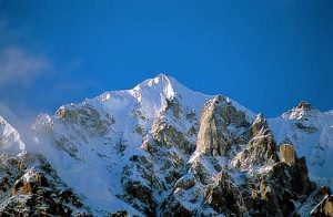 photo of snow capped Mt. Hkakabo Razi with blue sky