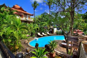 photo of garden and swimming pool at hotel by the red canal, Mandalay