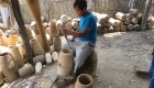 Photo of a men making shan drum