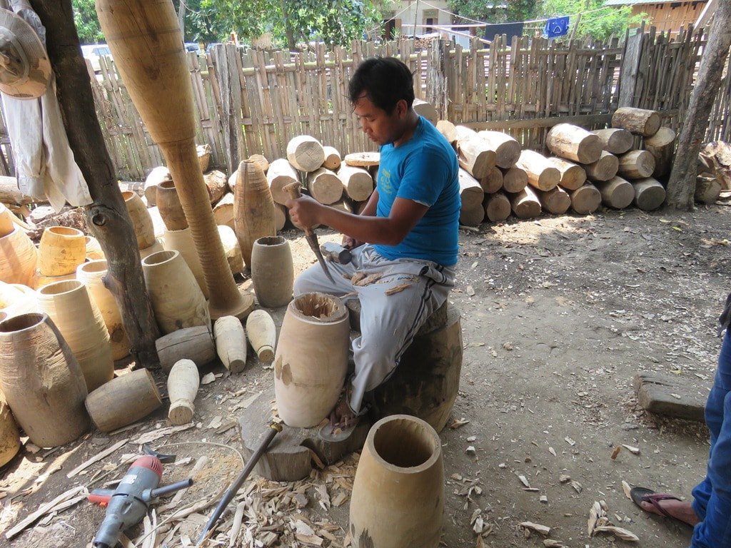 Photo of a men making shan drum