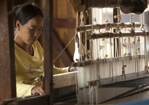 photo of a women weaving